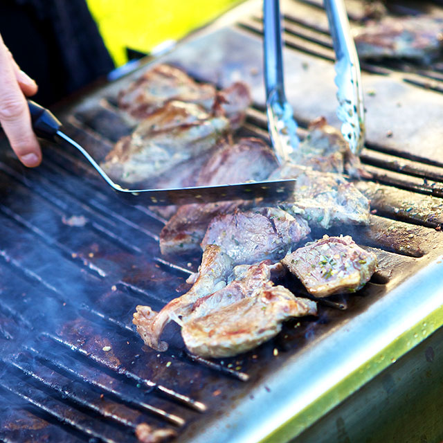 Photo of the Beetham Food team using the BBQ at a private party