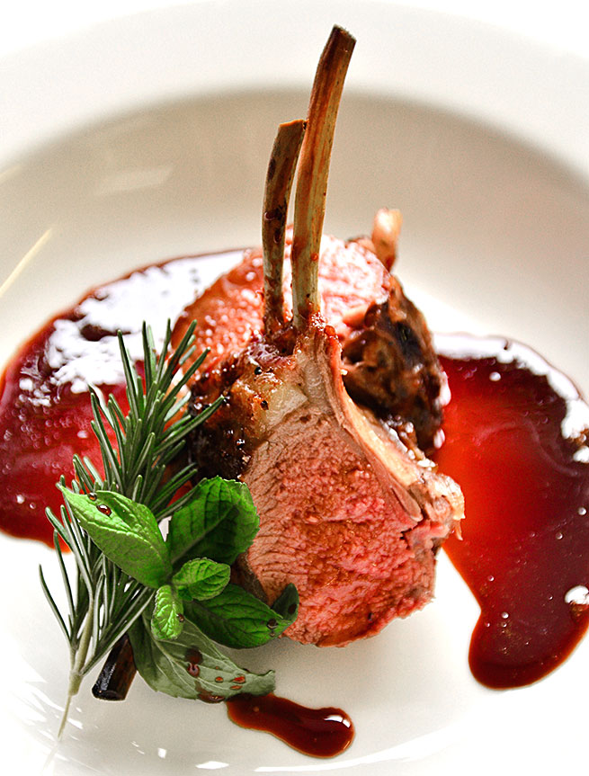 Rack of lamb in a rich sauce.