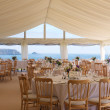 Shot of the scenery of the dining space by the coast, catered by Beetham Food.